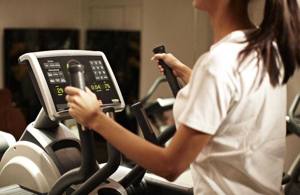 Buddha-Bar Hotel Budapest Klotild Palace Exterior photo A woman exercising on a cross trainer