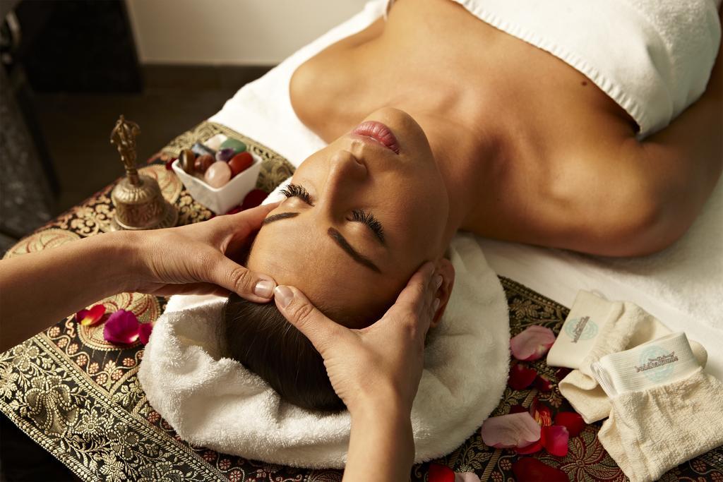 Buddha-Bar Hotel Budapest Klotild Palace Exterior photo A woman receiving a facial massage